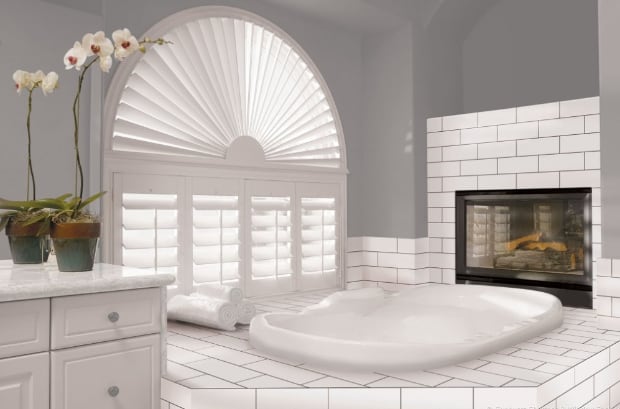 Arched window in bathroom